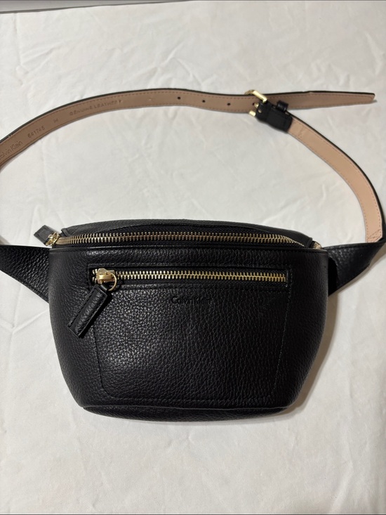 Calvin Klein Handbags - Calvin Klein Black Pebbled Leather womes Belt Bag with front zipper. Like new!